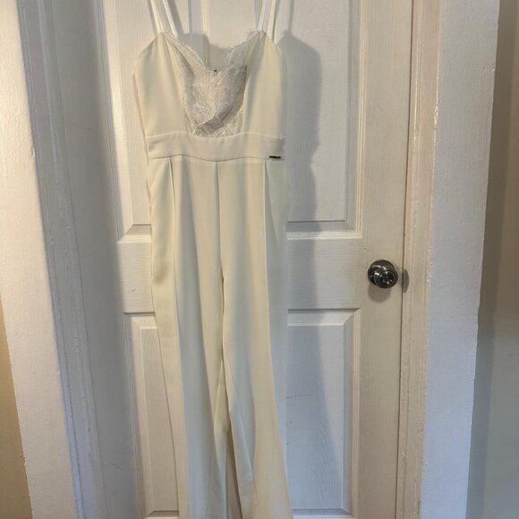 The Perfect most Glamorous White Jumpsuit! Elegant with a seamless fit! - Picture 6 of 8